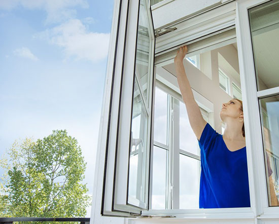 Retractable Legacy door screens, mounted on double-French doors.